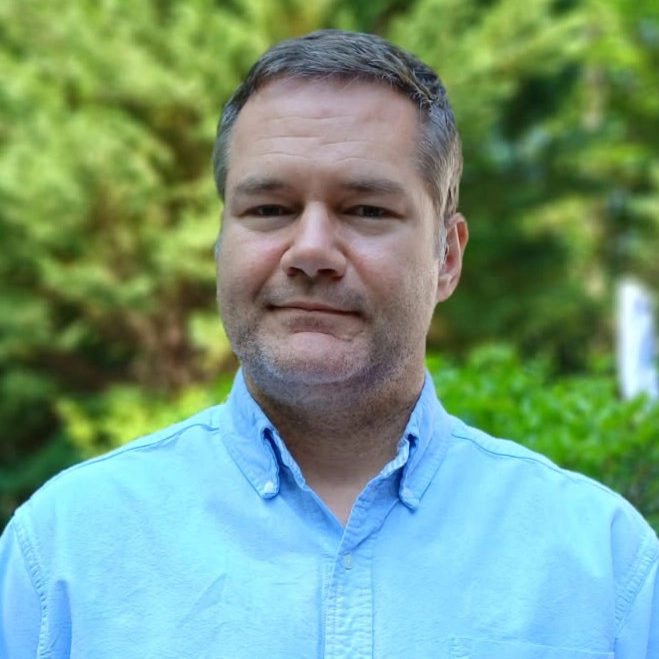 Headshot of Paul